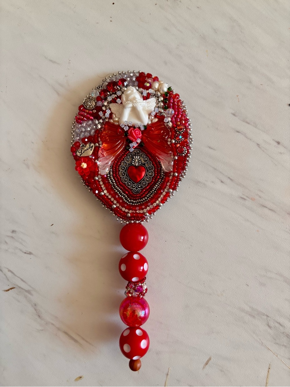 Beautiful Red free form Beaded Heart with Angel Accent handheld mirror